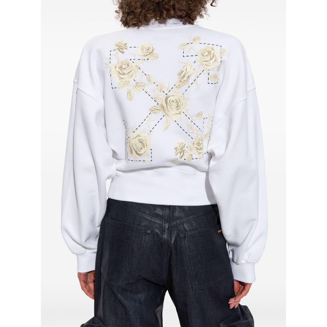White off white cropped sweater with back graphic of roses and arrows, crew neck, ribbed cuffs, rear graphic print.