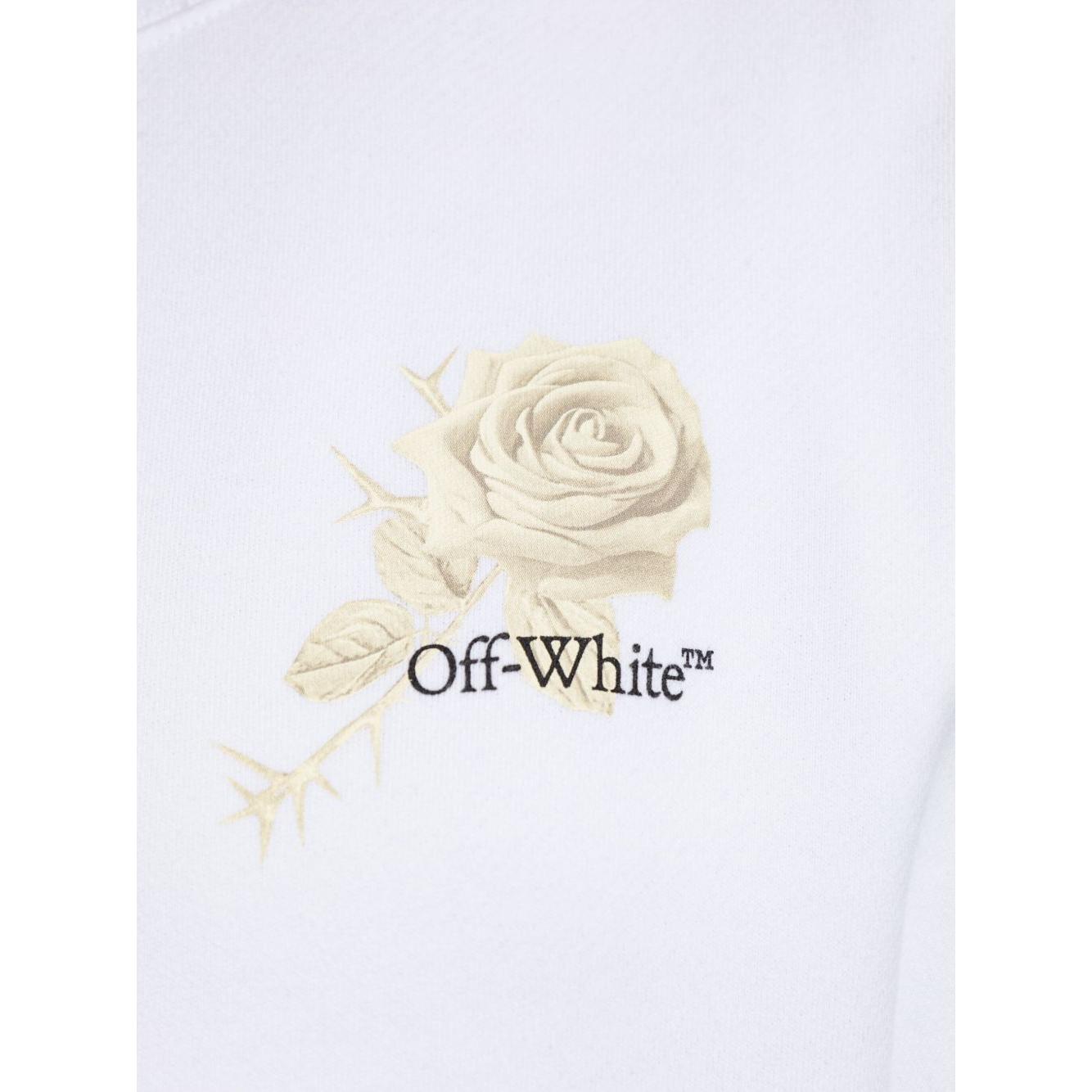 Close-up of Off White cropped sweatshirt with graphic rose and arrows on white fabric.