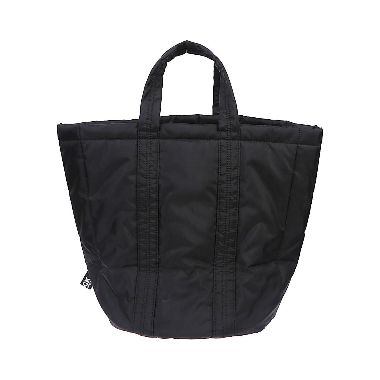 Black Comme Des Garcons panelled nylon tote bag with two handles, perfect for shopping, measuring 40x32x20 cm.
