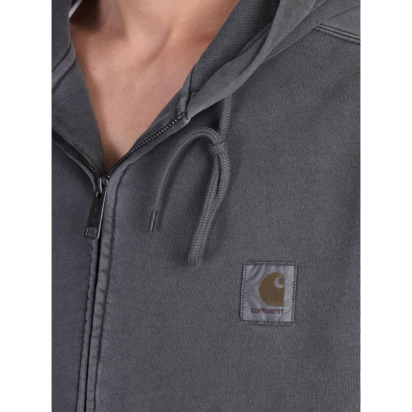 Carhartt WIP grey hoodie with logo, zip fastening, drawstring hood, side pockets, and ribbed hem and cuffs. Cotton material.