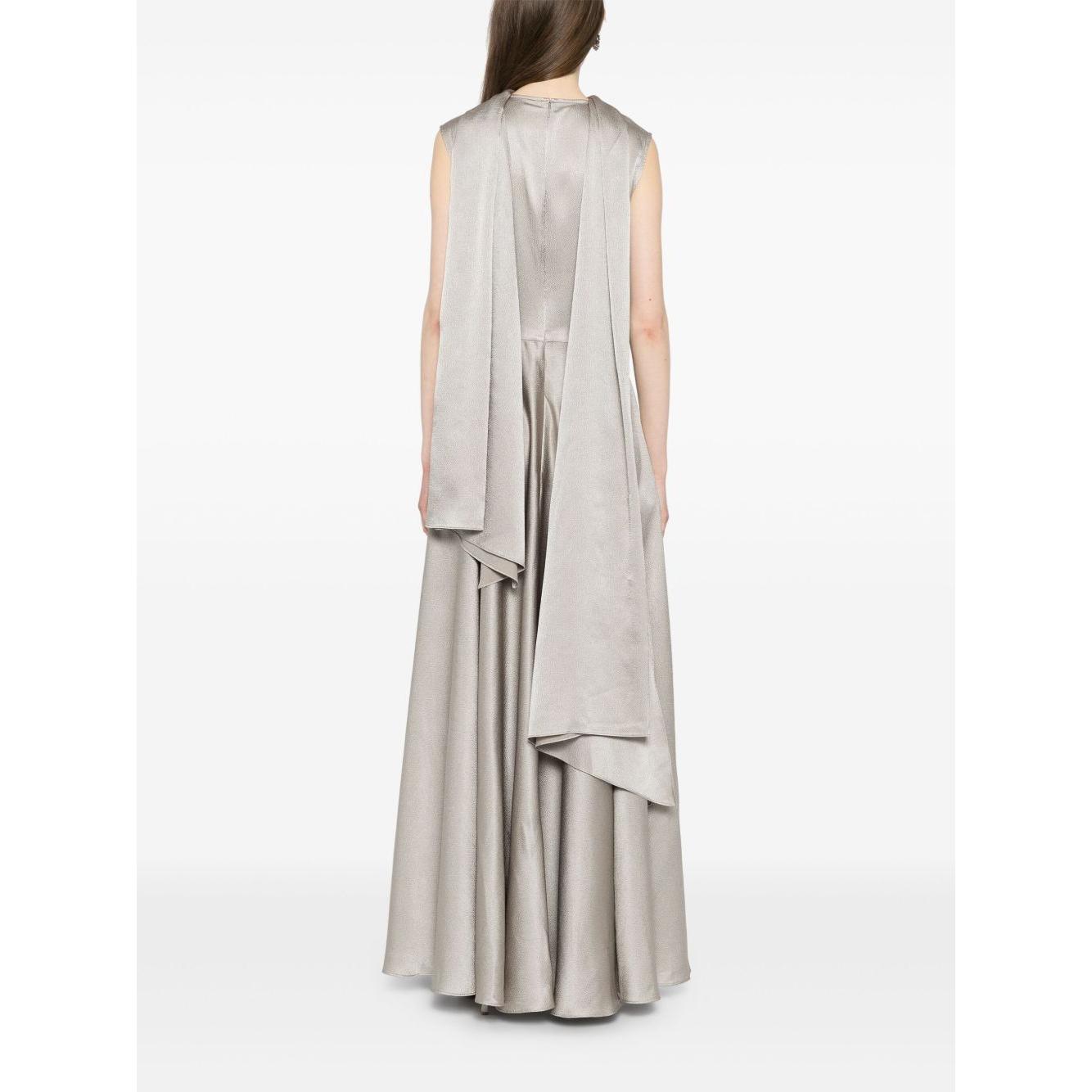 Back view of Solace London ash grey maxi dress with scarf detail and flared skirt, featuring concealed rear fastening, sleeveless design.