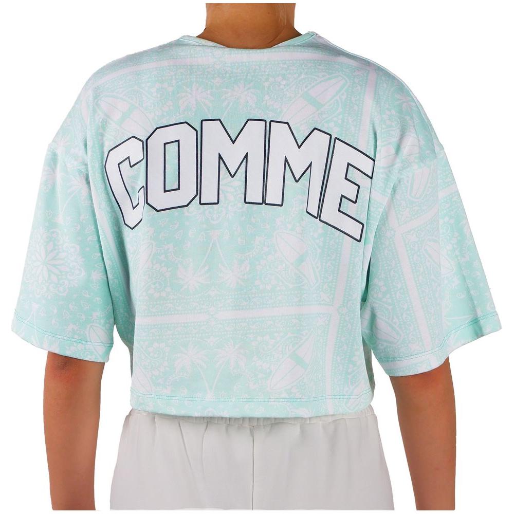 Back view of green Comme Des Fuckdown t-shirt with abstract print and bold logo.
