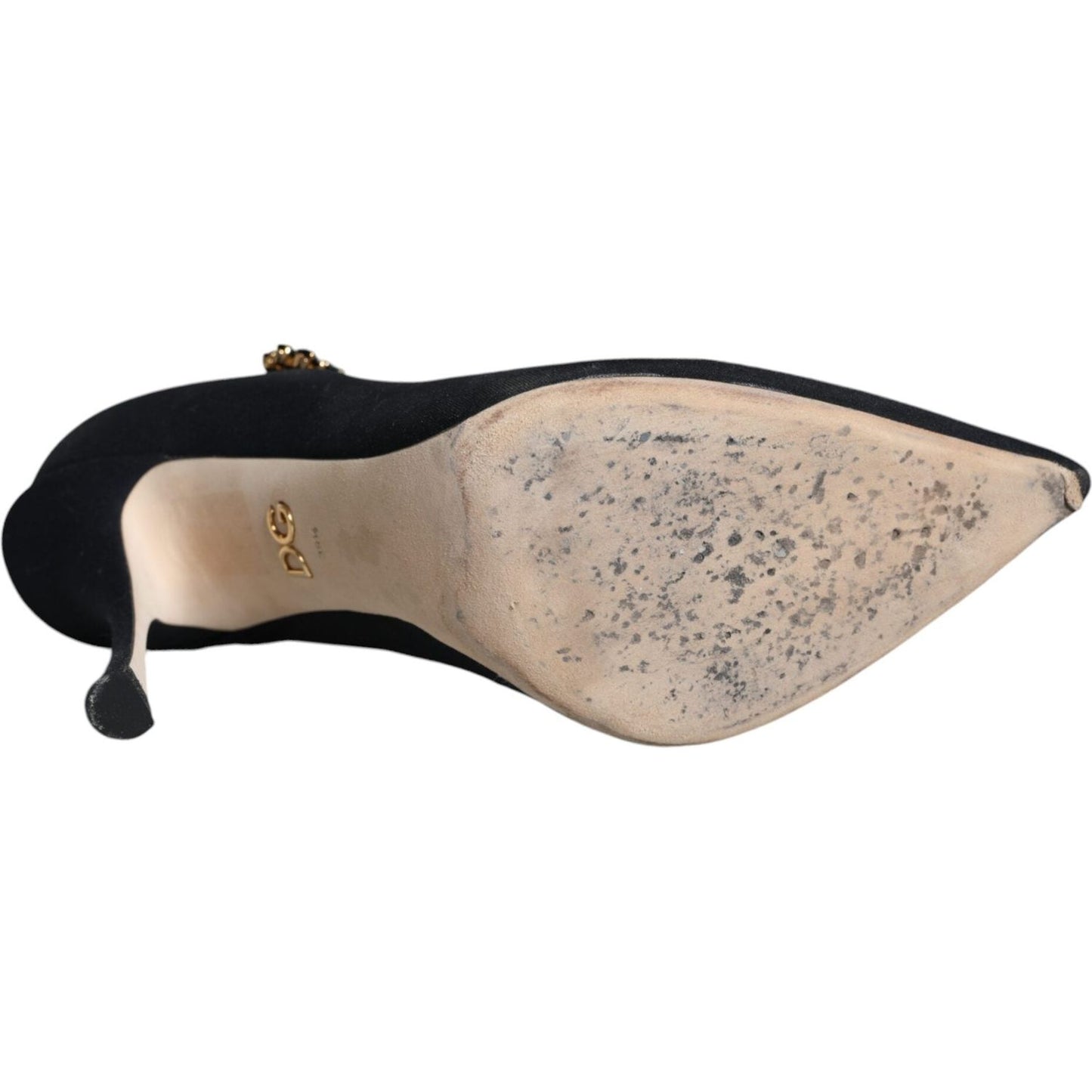 Sole view of Dolce & Gabbana Black Mary Jane Crystal Pumps showing minor wear, logo detail on leather sole, high-quality Italian craftsmanship.