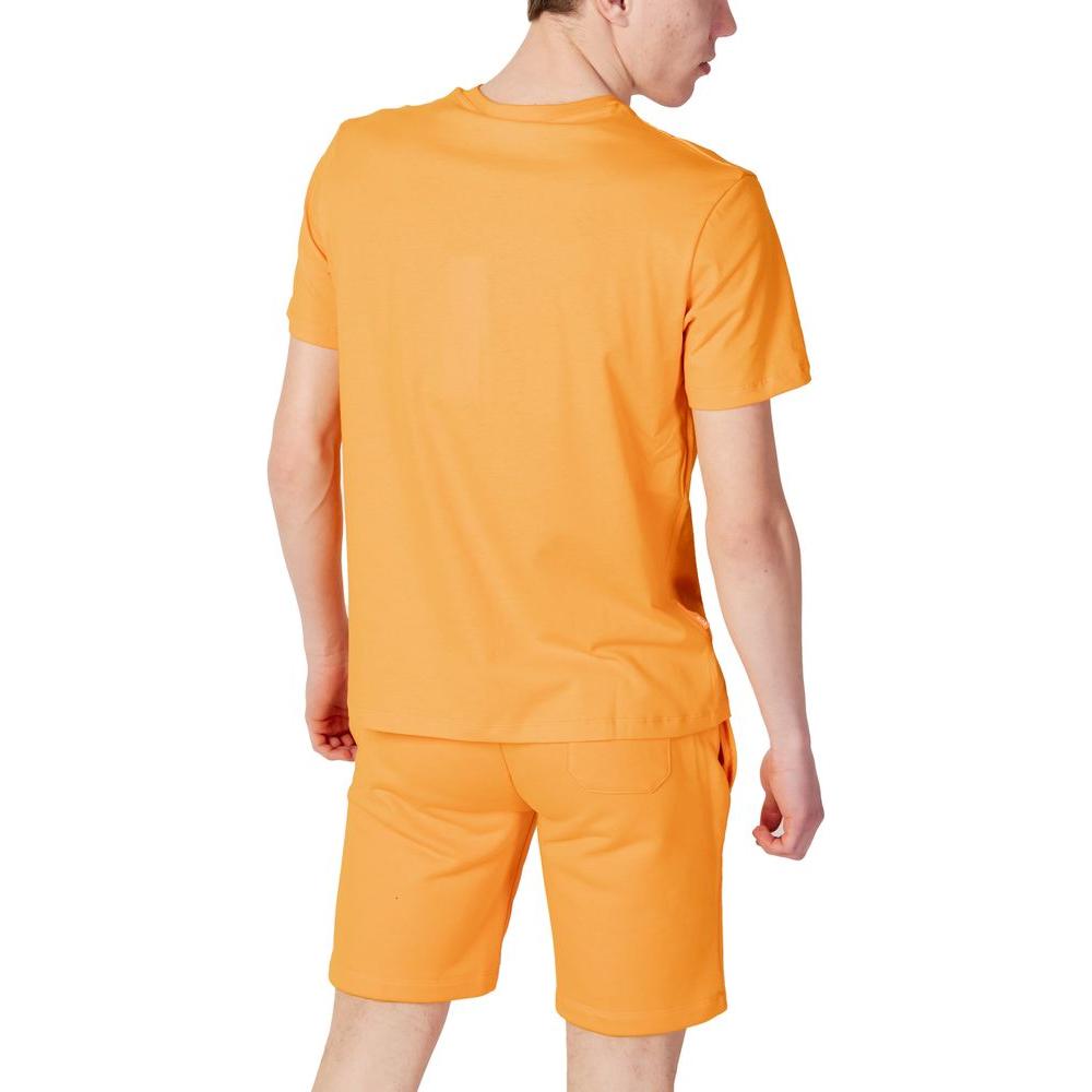 Back view of men's orange cotton T-shirt, part of the Spring/Summer collection. 100% cotton fabric designed for comfort.