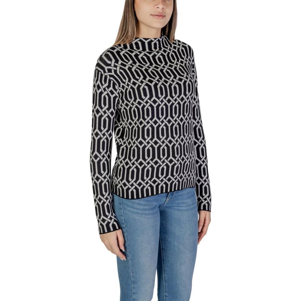 Woman wearing Street One black viscose sweater with geometric pattern, part of fall/winter women's knitwear collection.