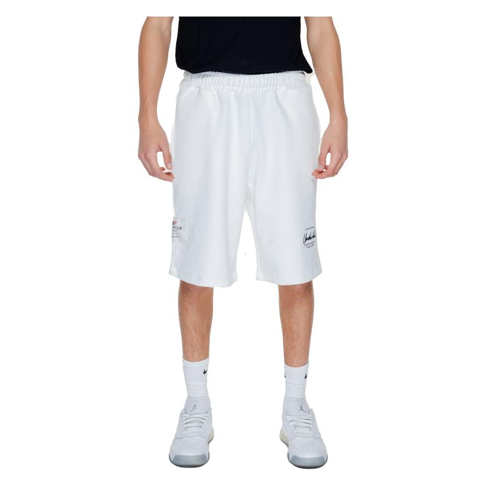 White men's Bermuda shorts, 100% cotton, part of Underclub Spring/Summer collection, modeled by standing person.