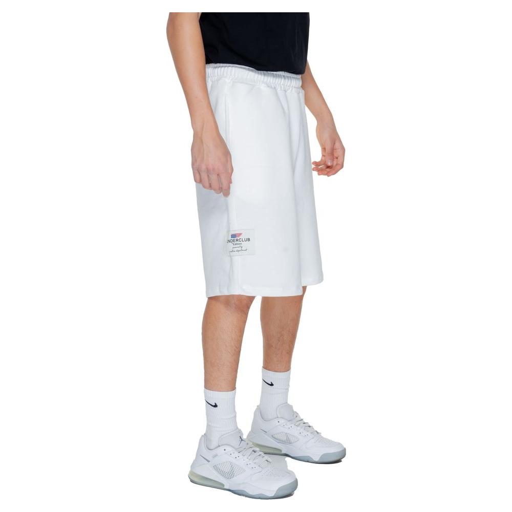 Man wearing Underclub white cotton Bermuda shorts, part of the spring/summer men's collection made from 100% cotton.