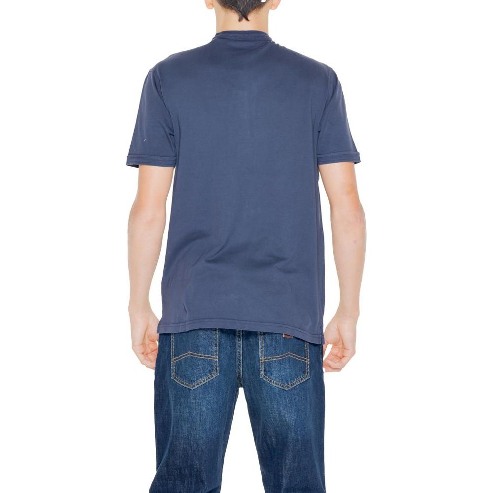 Back view of a man wearing a Hamaki-Ho Blue Cotton T-Shirt, part of the Spring/Summer collection, made from 100% cotton.