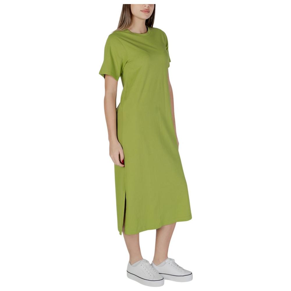 B.Young green cotton dress for women, perfect for spring/summer collection, made from 100% cotton, featuring short sleeves and side slit.