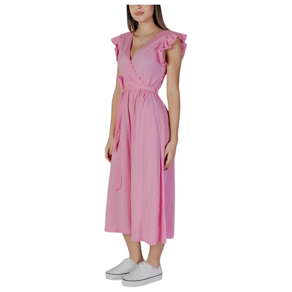 Model wearing a B.Young multicolor cotton dress, ideal for spring and summer, showcasing lightweight 100% cotton fabric and elegant design.
