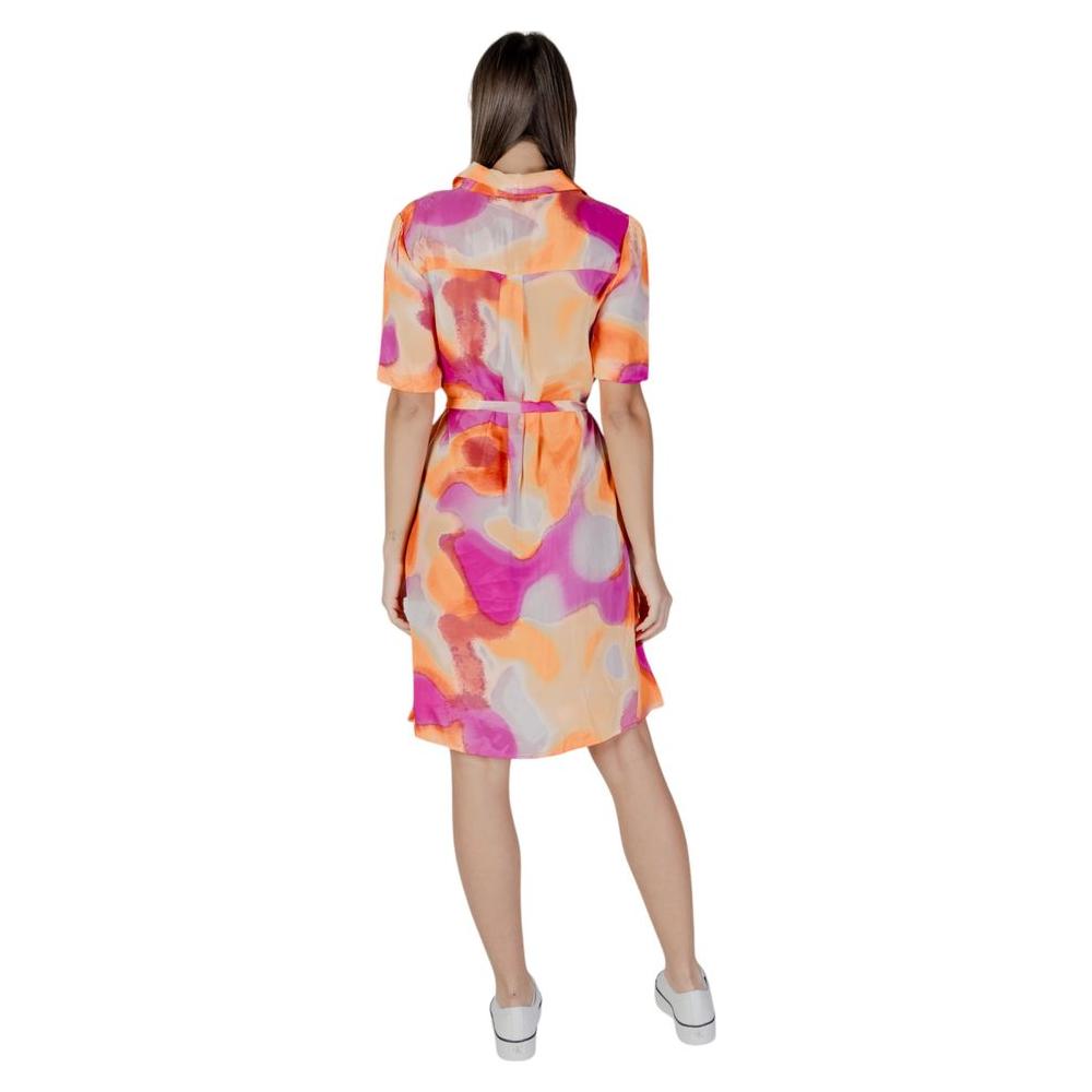 Back view of a B.Young orange cotton dress with colorful abstract patterns, part of the women's spring/summer collection.