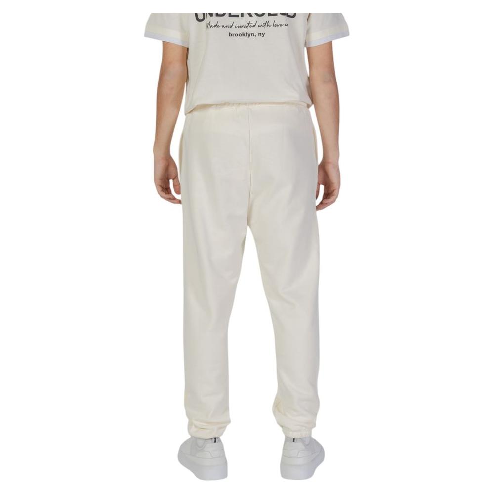 Back view of men's Underclub Cream Cotton Pants, 100% cotton, Fall/Winter collection, showcasing casual style and comfort.