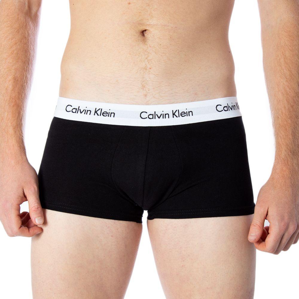 Calvin Klein black cotton boxers with elastic waistband for men, featuring comfortable fit and stylish design for everyday wear.