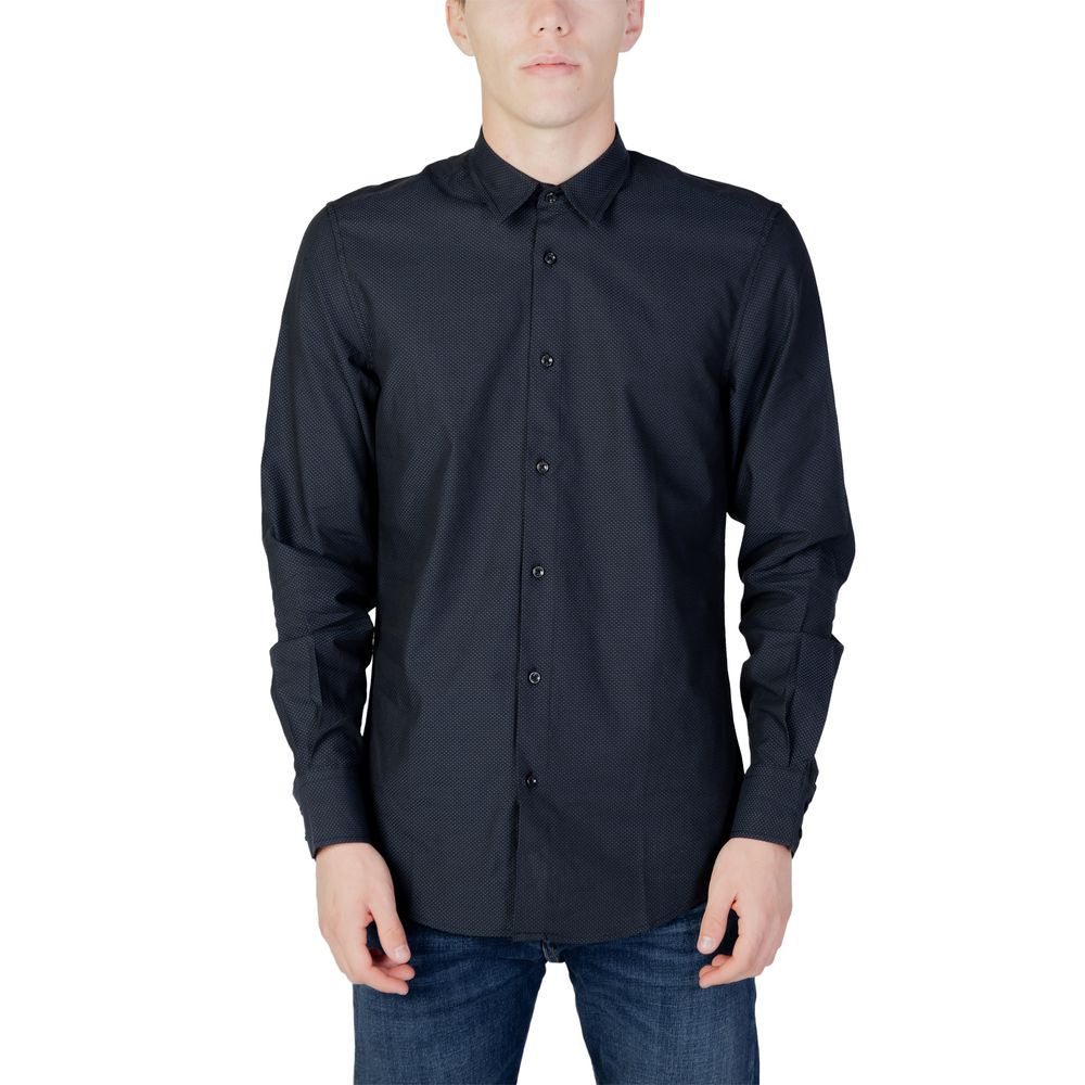 Men's long sleeve black shirt, front view. Ideal for autumn/winter fashion. Made of 100% cotton, perfect for casual or formal wear.