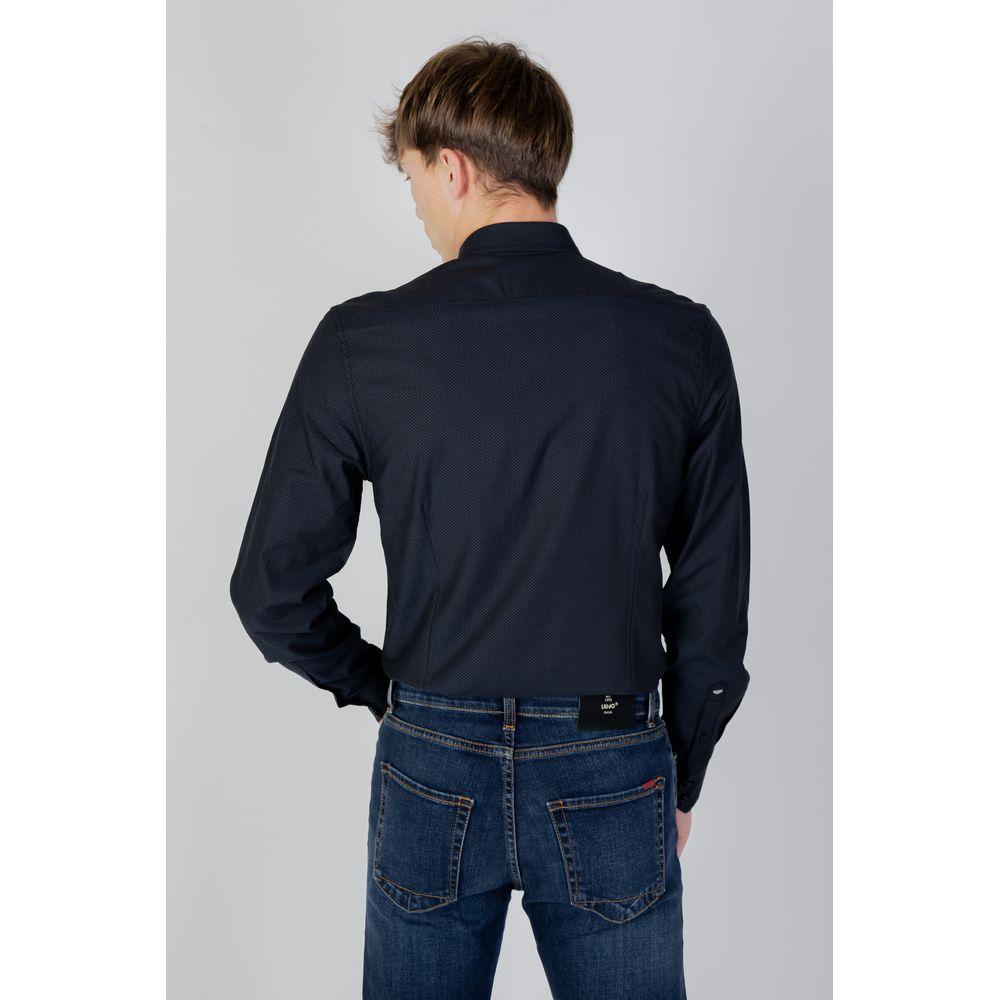 Back view of a man wearing an Antony Morato blue cotton long sleeve shirt from the Autumn/Winter collection.
