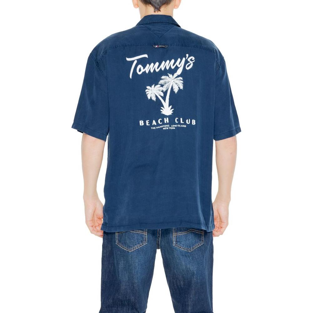 Back view of a men's Tommy Hilfiger blue short sleeve Lyocell shirt with "Tommy's Beach Club" palm tree print.