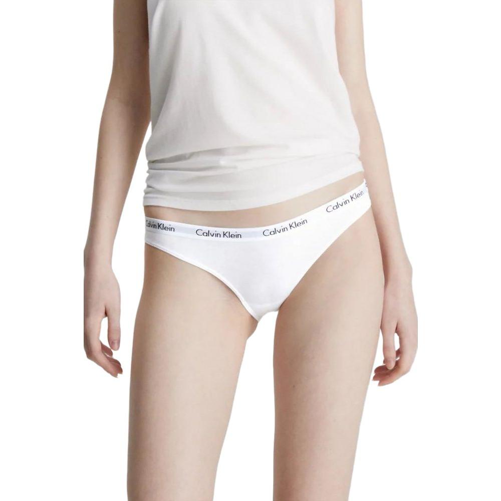 Woman wearing Calvin Klein white cotton underwear bikini, showcasing casual style and comfort.