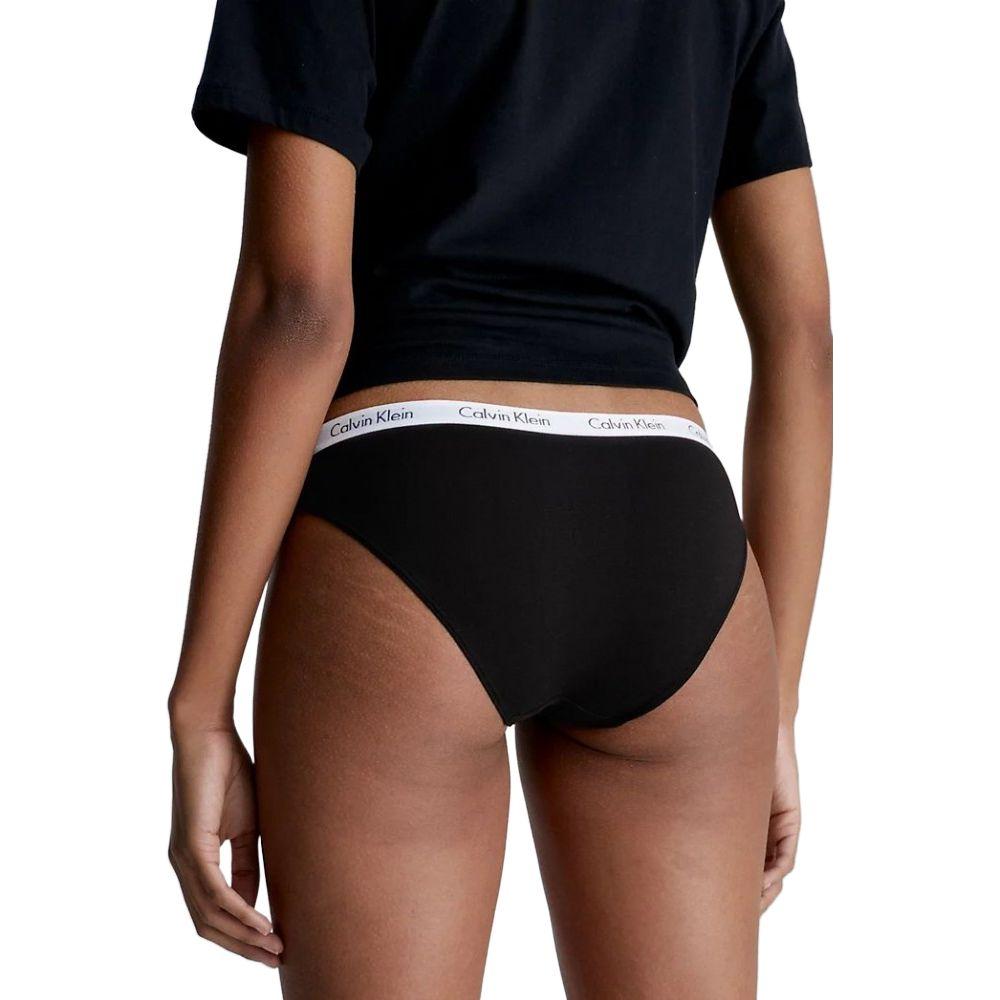 Back view of Calvin Klein black bikini underwear with logo waistband, offering comfort and style.
