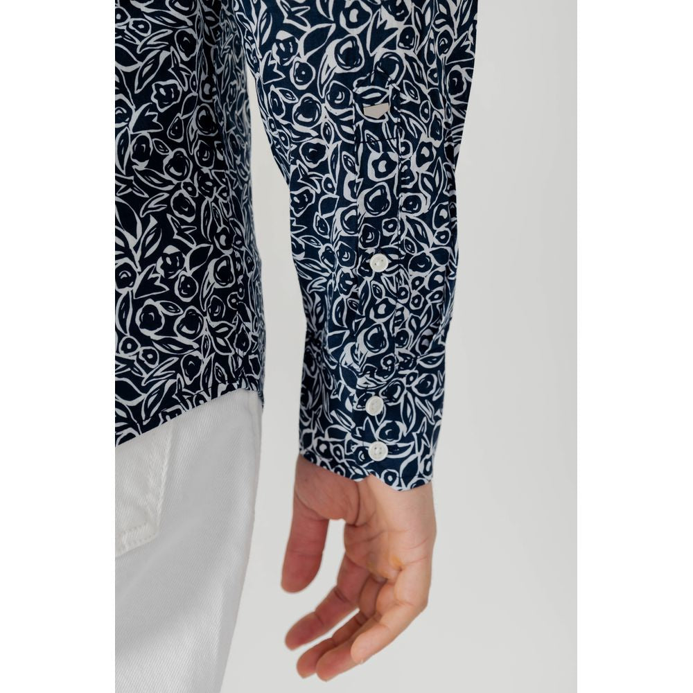 Close-up of Antony Morato blue cotton men's long sleeve shirt with floral pattern, ideal for spring/summer collection.