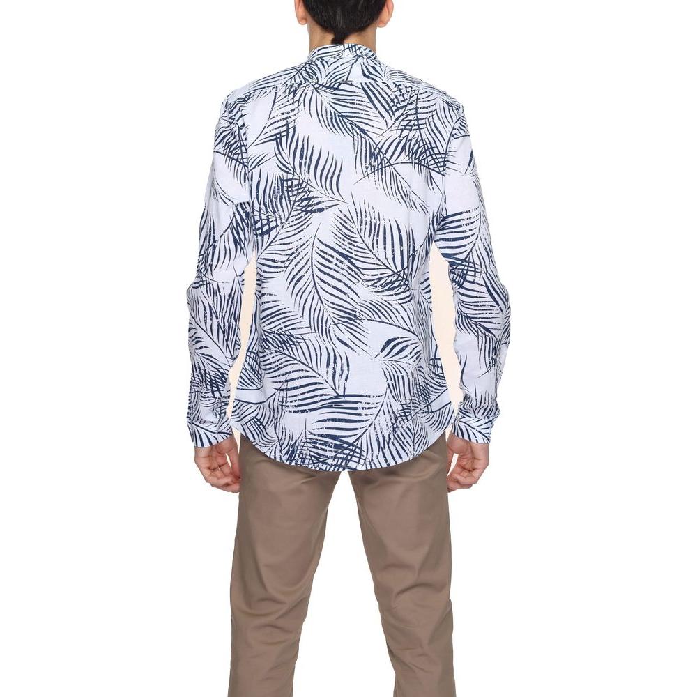 Model wearing a men's long sleeve shirt with blue leaf pattern, part of the Antony Morato Spring/Summer collection, 75% cotton, 25% linen.