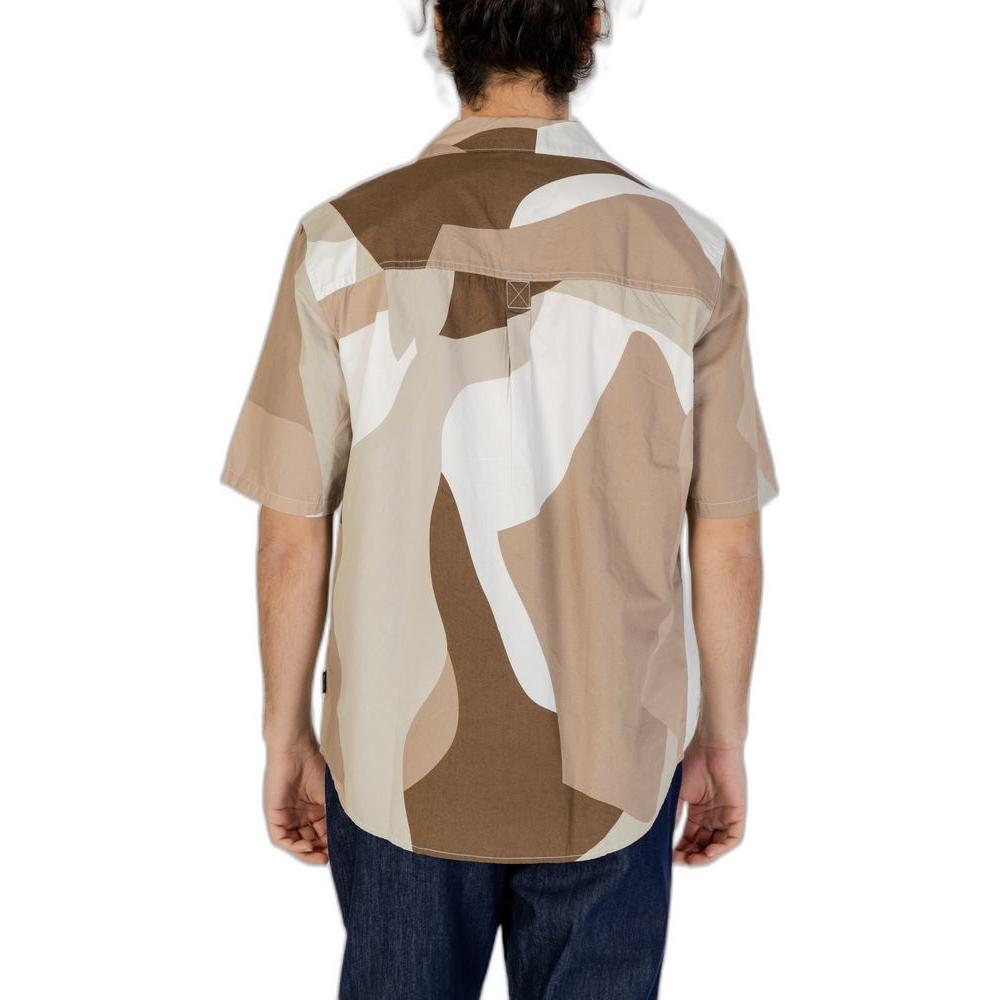 Man wearing Only & Sons brown cotton short sleeve shirt from the Spring/Summer collection, featuring a unique abstract pattern.