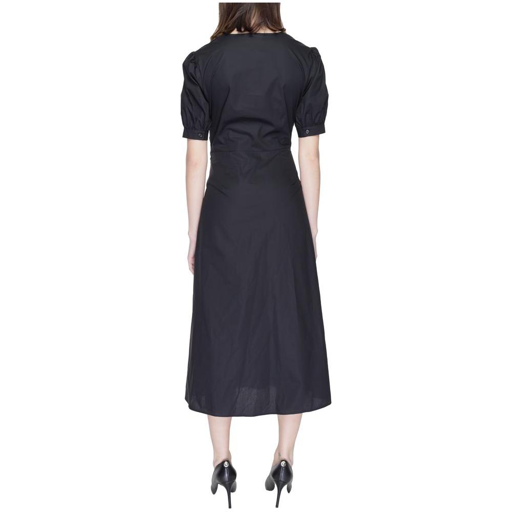 Back view of Alviero Martini Prima Classe black cotton dress, women's long style, Spring/Summer collection, 100% cotton.