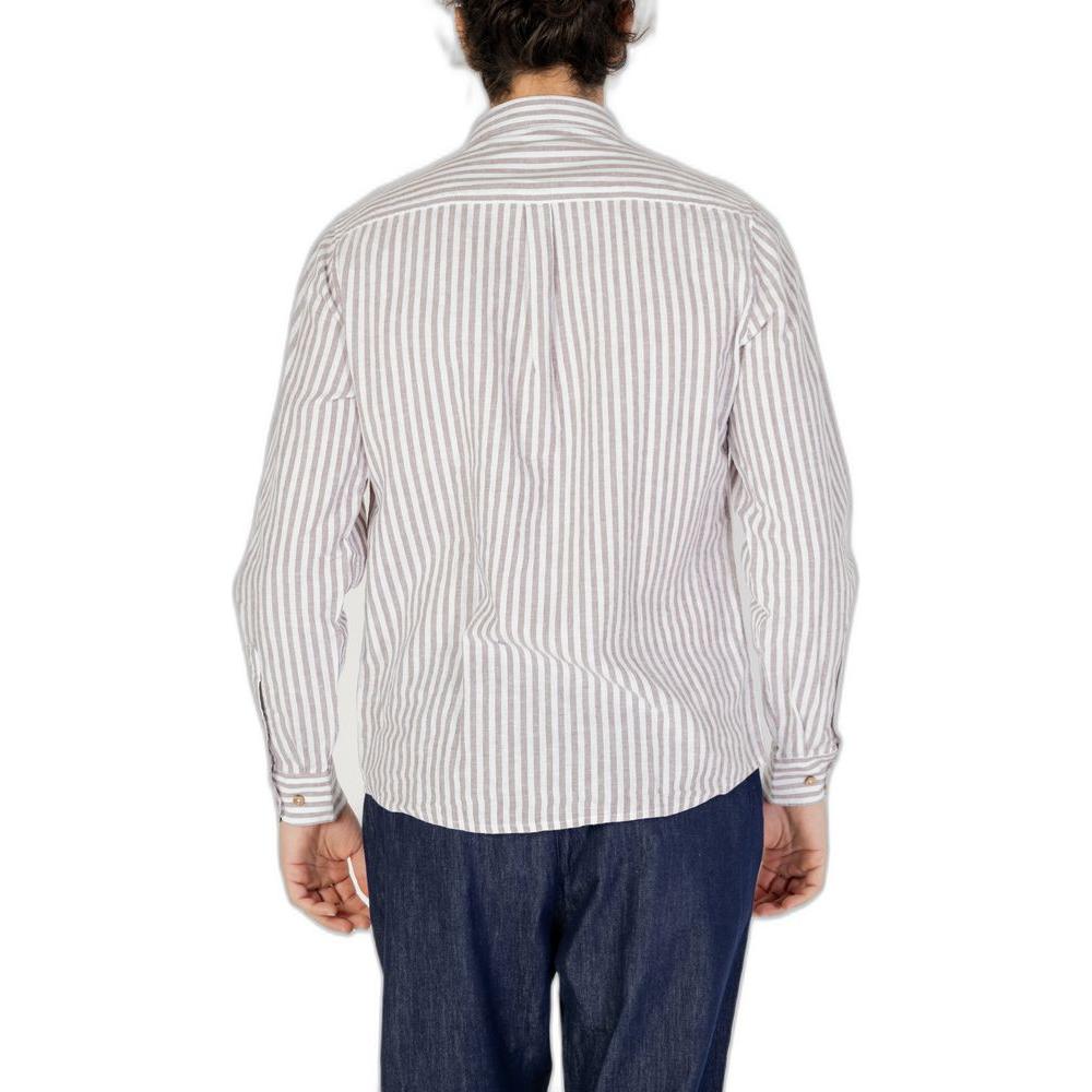 Back view of man wearing a Hamaki-Ho brown linen long-sleeve shirt from the spring/summer collection, paired with blue jeans.
