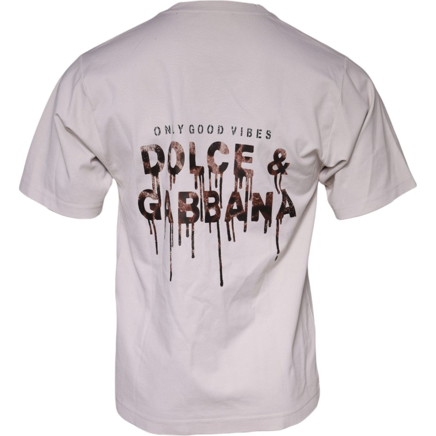 Back view of Dolce & Gabbana beige crew neck t-shirt with logo and graphic print, short sleeves, cotton blend, minor stains visible.