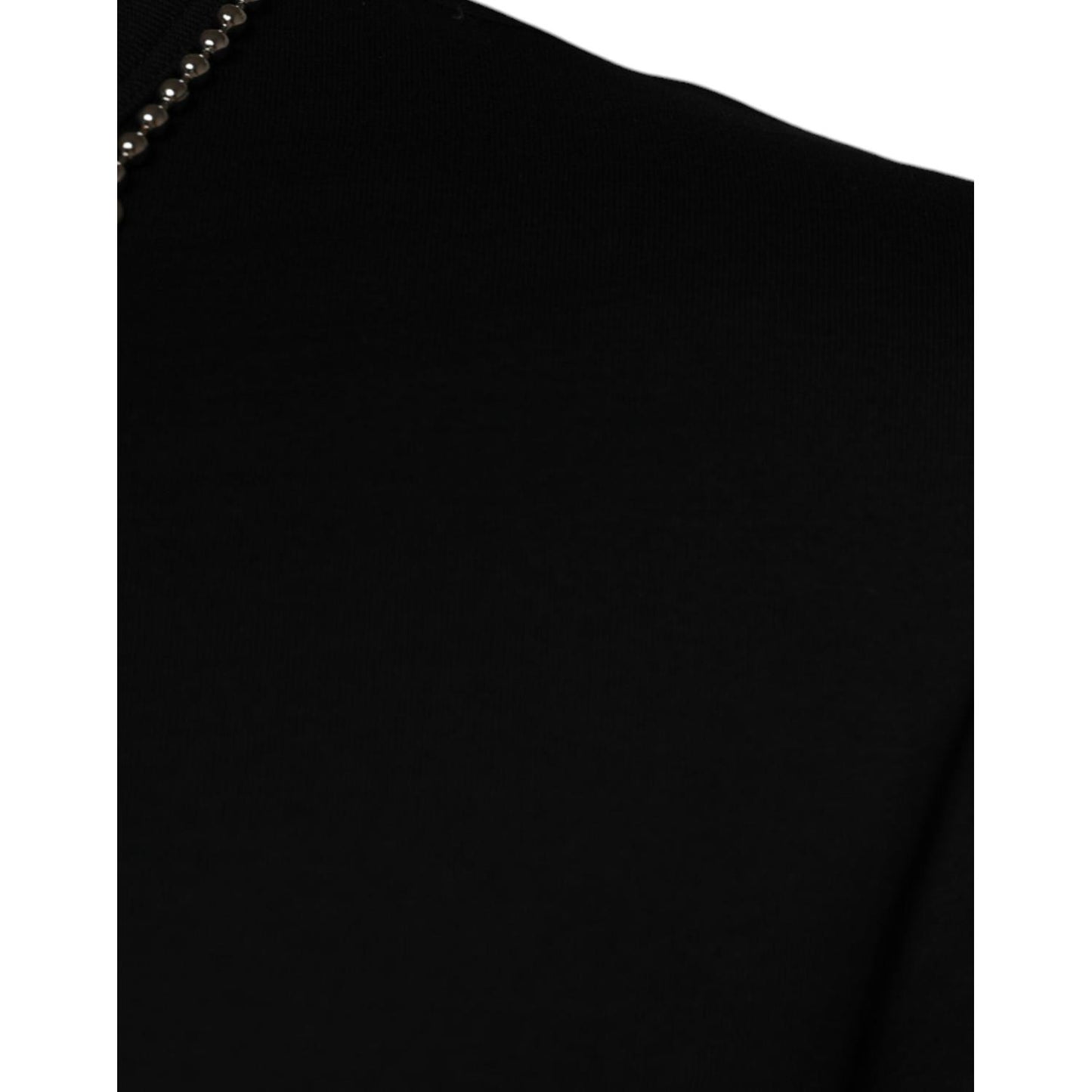 Close-up of Dolce & Gabbana black cotton T-shirt with necklace embellishment detail, showcasing luxury fashion design.