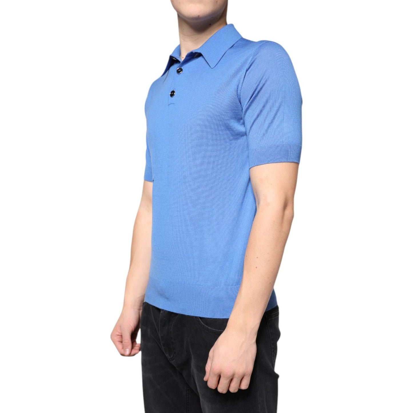 Dolce & Gabbana blue cashmere men's polo shirt, short sleeves, collared neck, button closure, front view, model wearing black pants