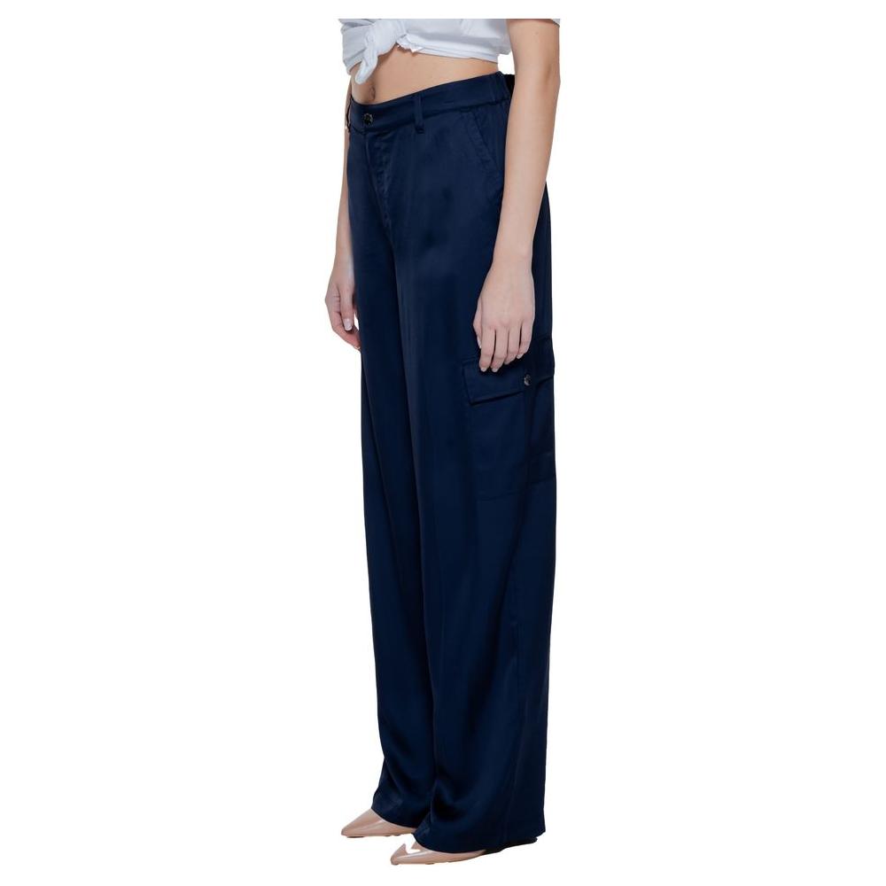 Woman wearing Street One blue viscose palazzo pants from the spring/summer collection, showing side view.