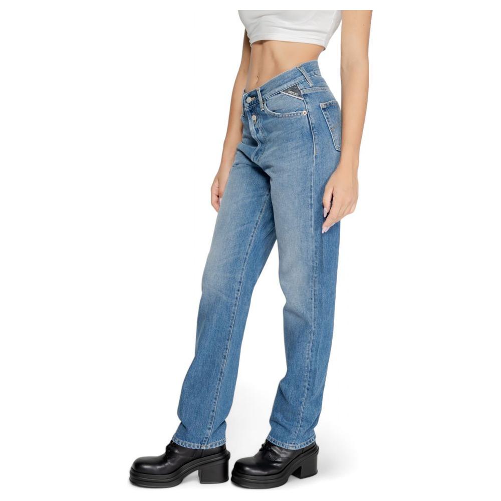 Woman wearing Replay blue cotton jeans, part of the Fall/Winter collection, showcasing a stylish and comfortable casual look.