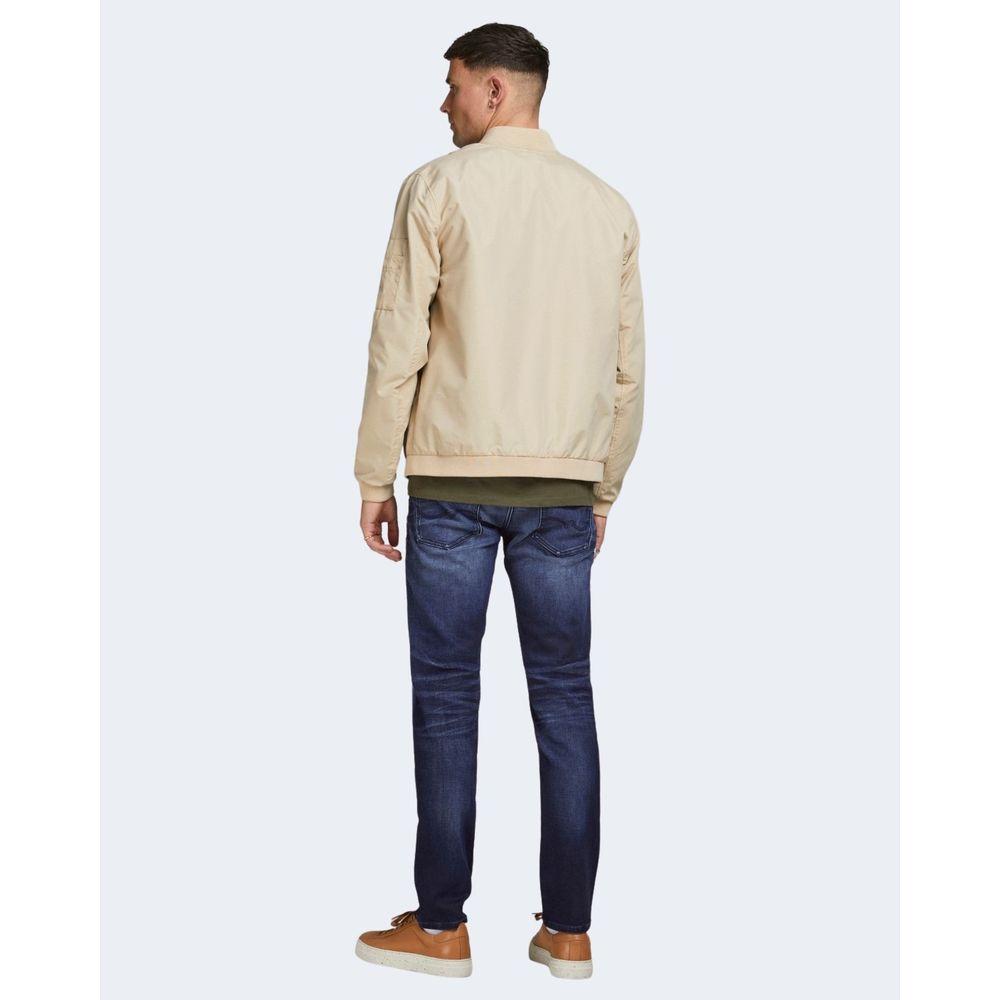 Back view of model wearing Jack Jones blue cotton jeans with regular fit, highlighting comfort and blend of cotton and elastane.