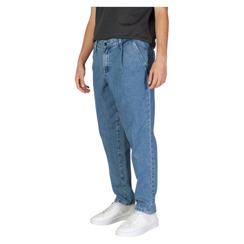 Jack Jones men's blue cotton jeans, regular fit, loose style for fall/winter. 95% cotton, 5% recycled cotton, side view.