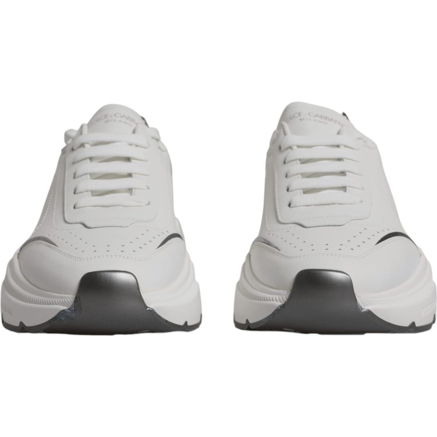 Dolce & Gabbana white silver leather DAYMASTER sneakers with lace-up closure and rubber sole, logo details, front view.