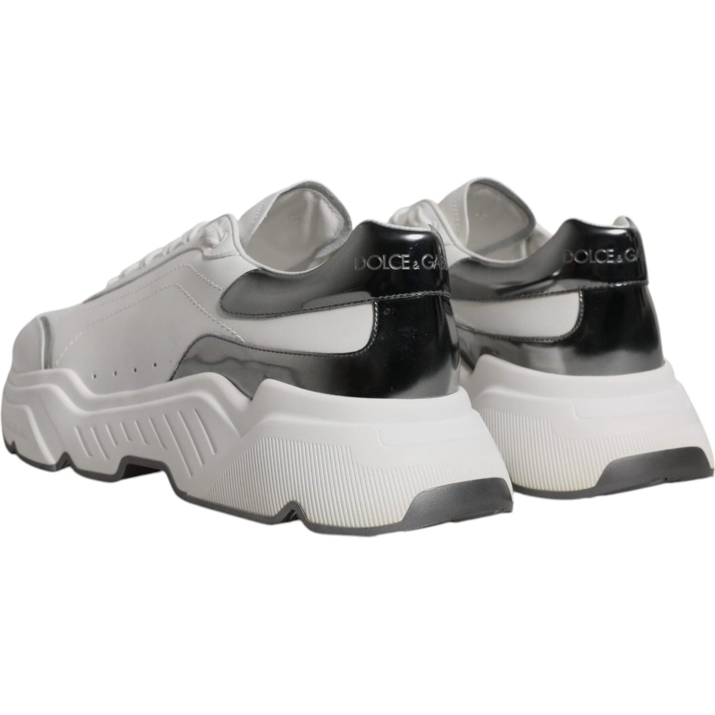 Dolce & Gabbana white silver DAYMASTER leather sneakers, rear view, featuring logo details and thick rubber sole.