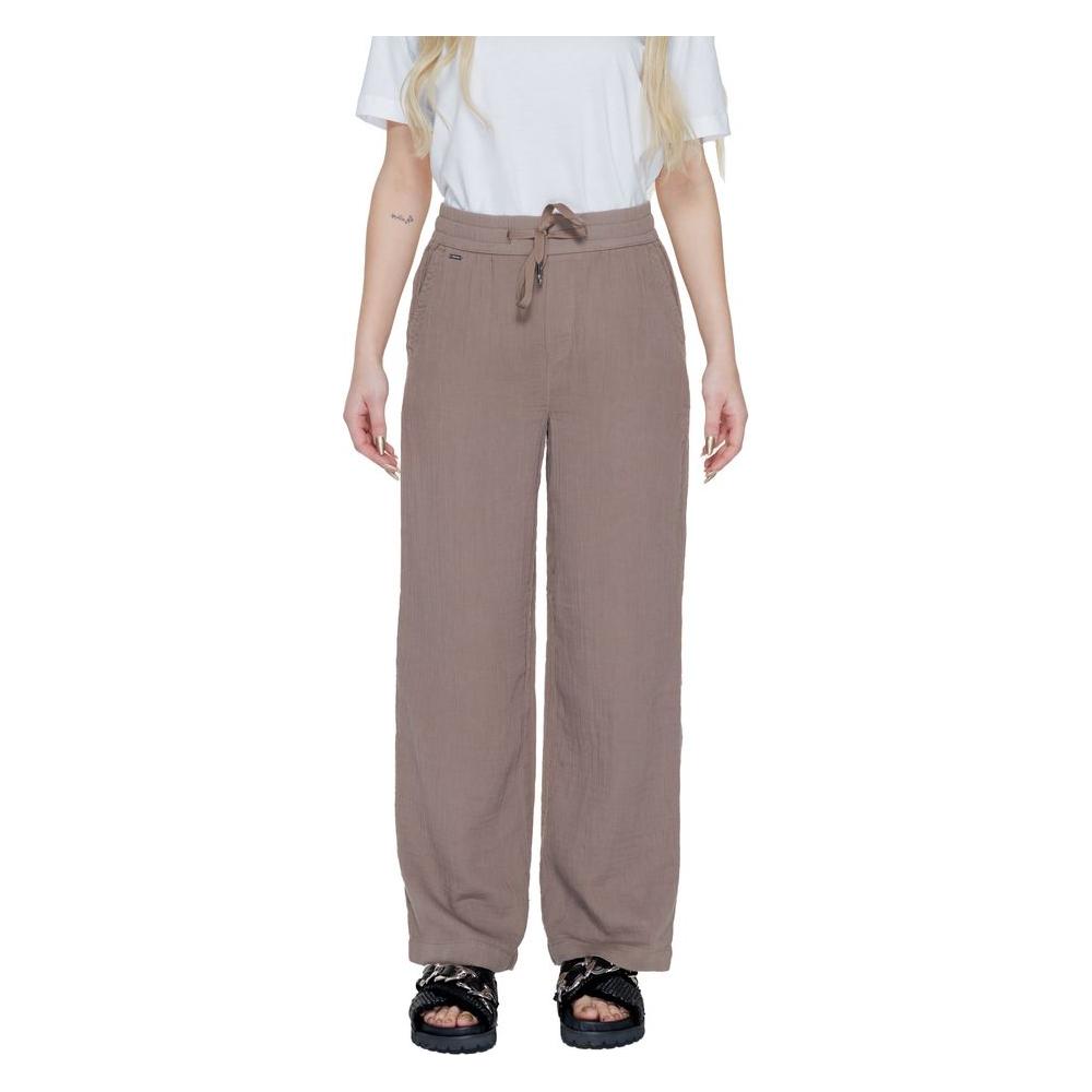 Woman wearing Street One brown cotton palazzo pants for spring/summer collection.