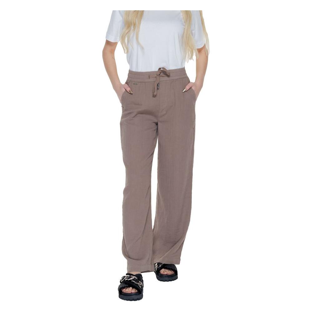 Woman wearing Street One brown cotton palazzo pants from the Spring/Summer collection, featuring 100% breathable cotton.
