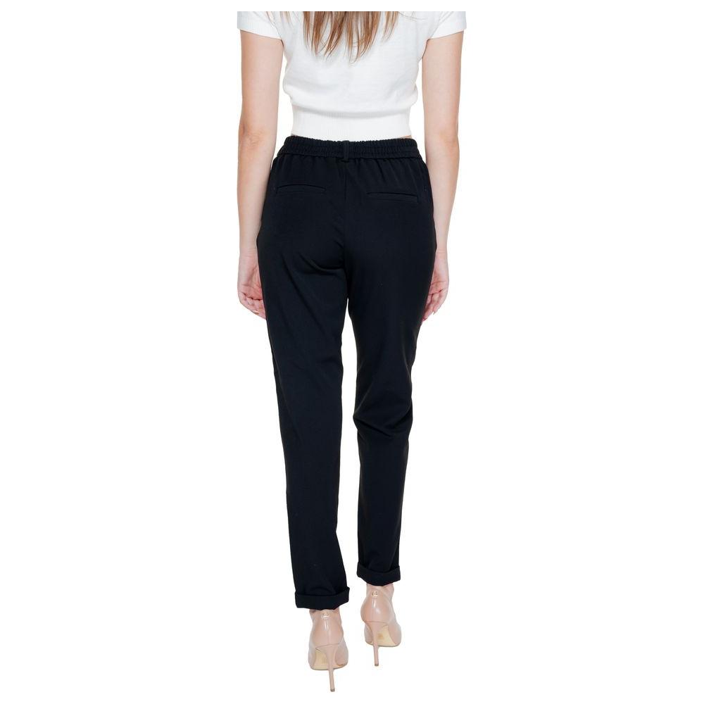 Back view of Vero Moda women's regular black polyester pants for spring/summer collection, featuring elastic waistband.