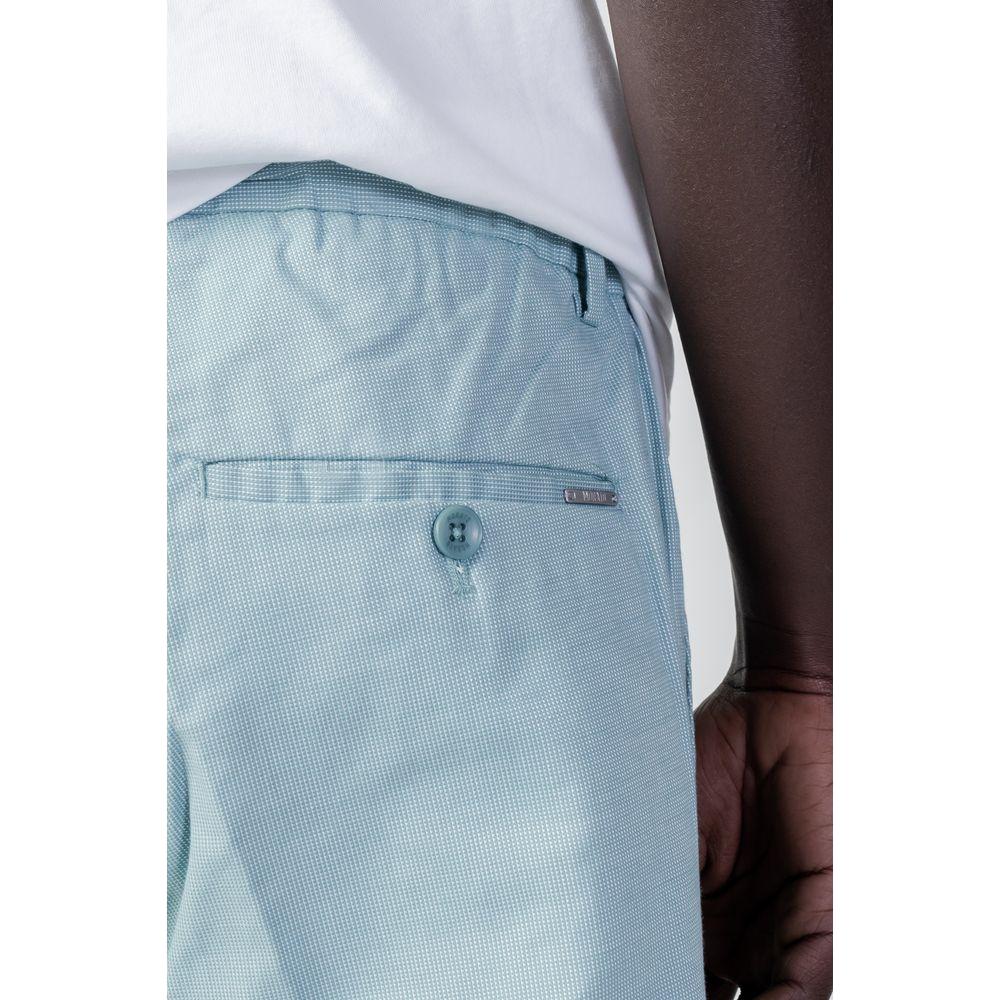 Close-up of a man wearing Antony Morato green cotton shorts, showcasing the back pocket details and button closure.