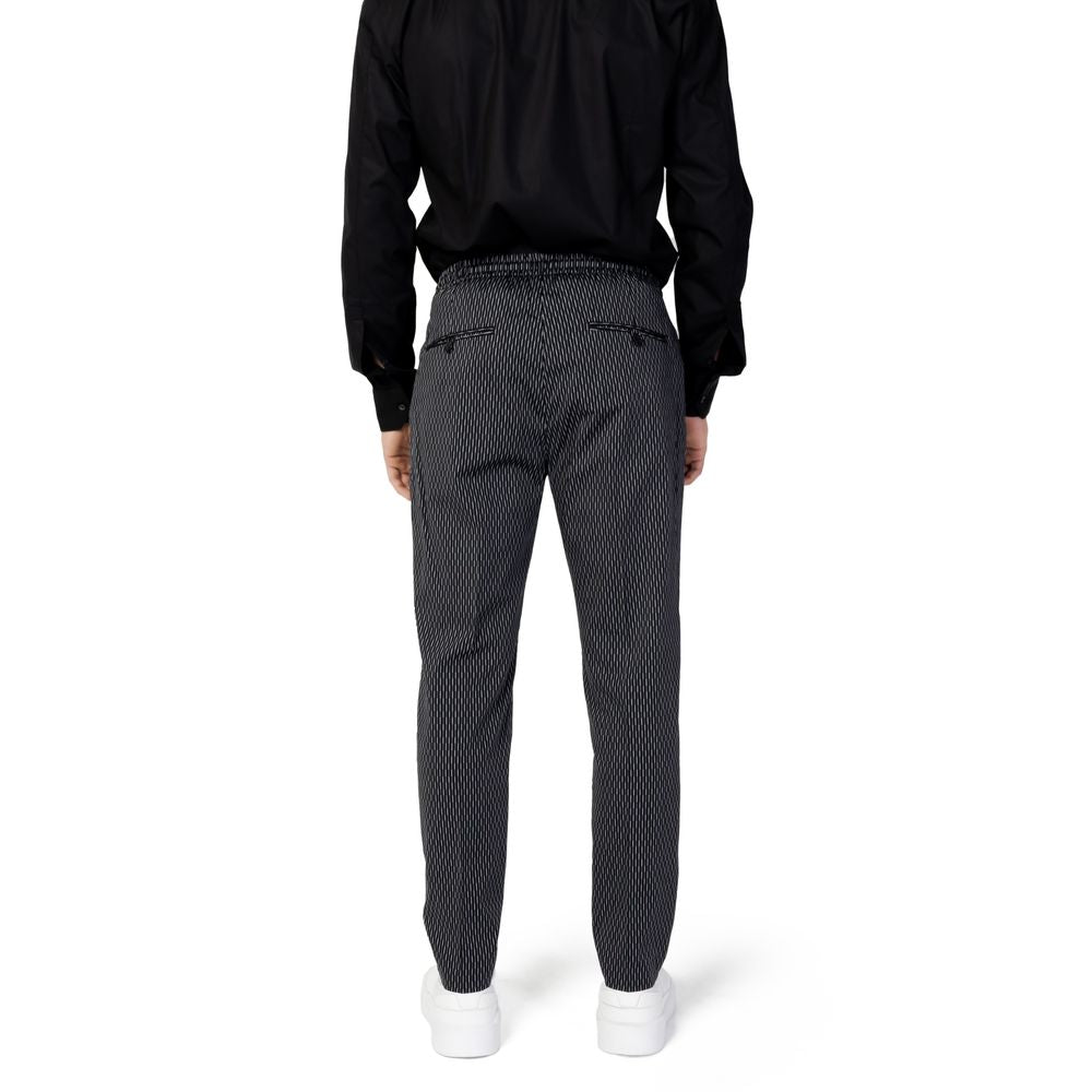 Back view of Antony Morato black cotton men's pants MMTR00679-FA950188, showcasing regular fit and elegant design.