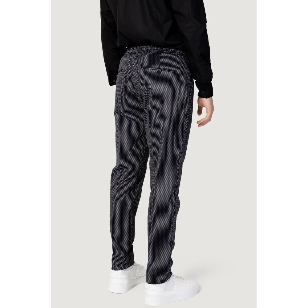 Back view of Antony Morato black cotton jeans, model MMTR00679-FA950188, showcasing regular fit design ideal for spring and summer.