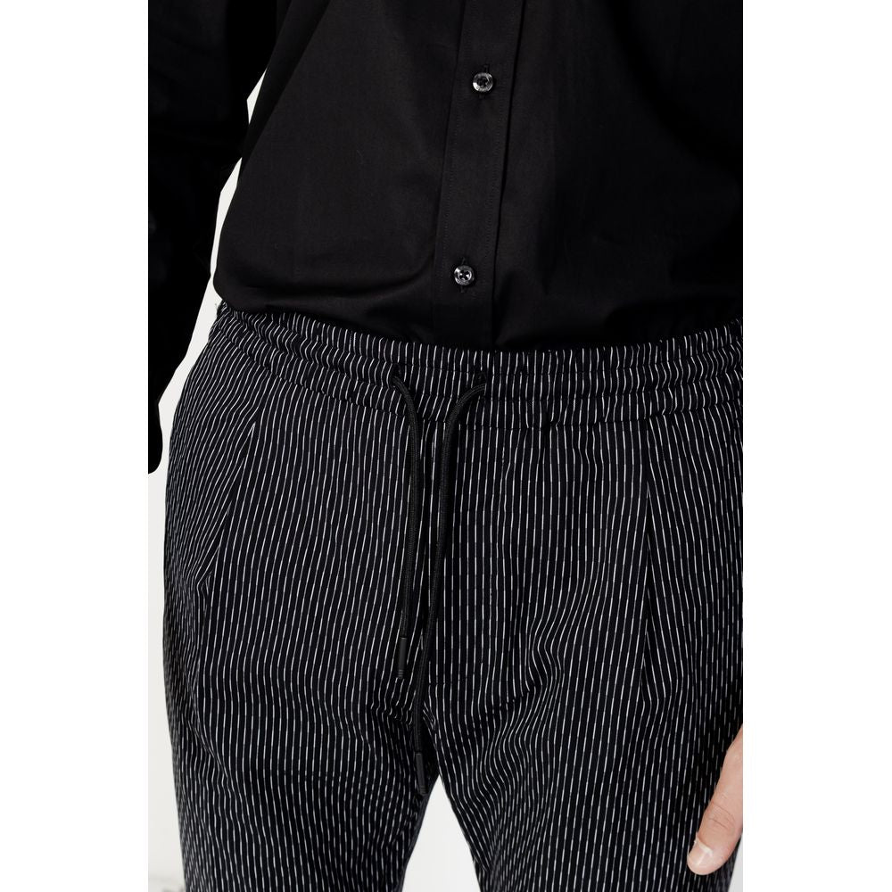 Antony Morato black cotton striped pants detail, model MMTR00679-FA950188, showcasing elegant and comfortable fit.