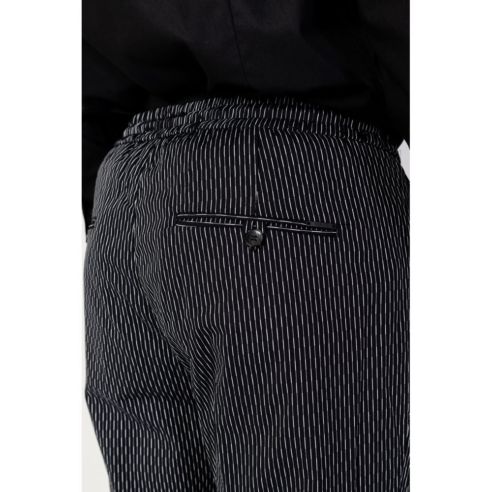 Antony Morato black cotton pinstripe pants, rear view showcasing elegant design and comfortable fit for men, model MMTR00679-FA950188.