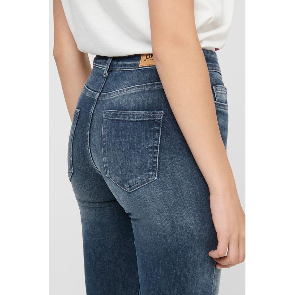 Back view of women's blue skinny cotton jeans with pockets, showcasing modern fit and style.