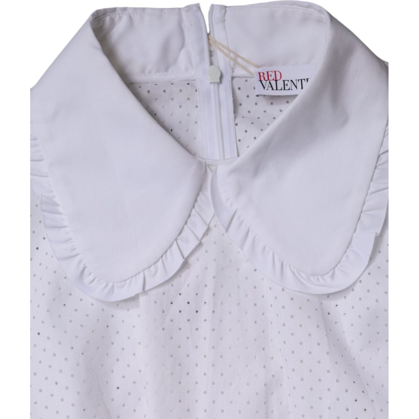 Valentino white cotton collared blouse with short sleeves, featuring a RED VALENTINO logo and minor collar stains.