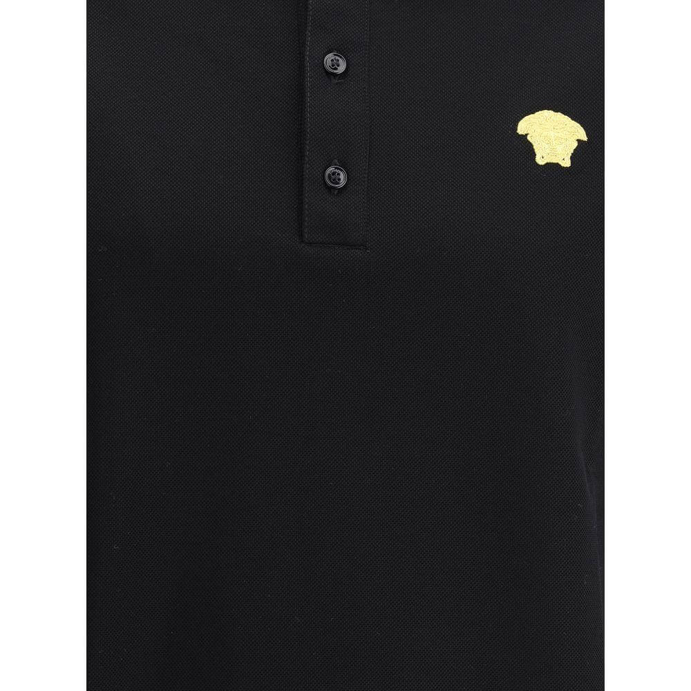 Black Versace cotton polo shirt with ribbed collar, tone-on-tone buttons, and iconic logo patch on the front.