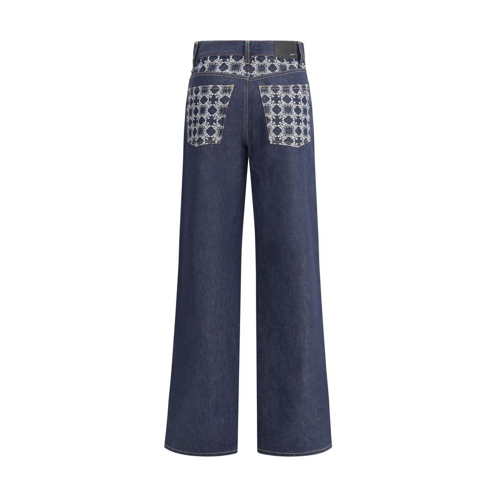 Back view of Amiri wide leg jeans with embossed pockets and palazzo cut, showcasing brand logo and contemporary design.