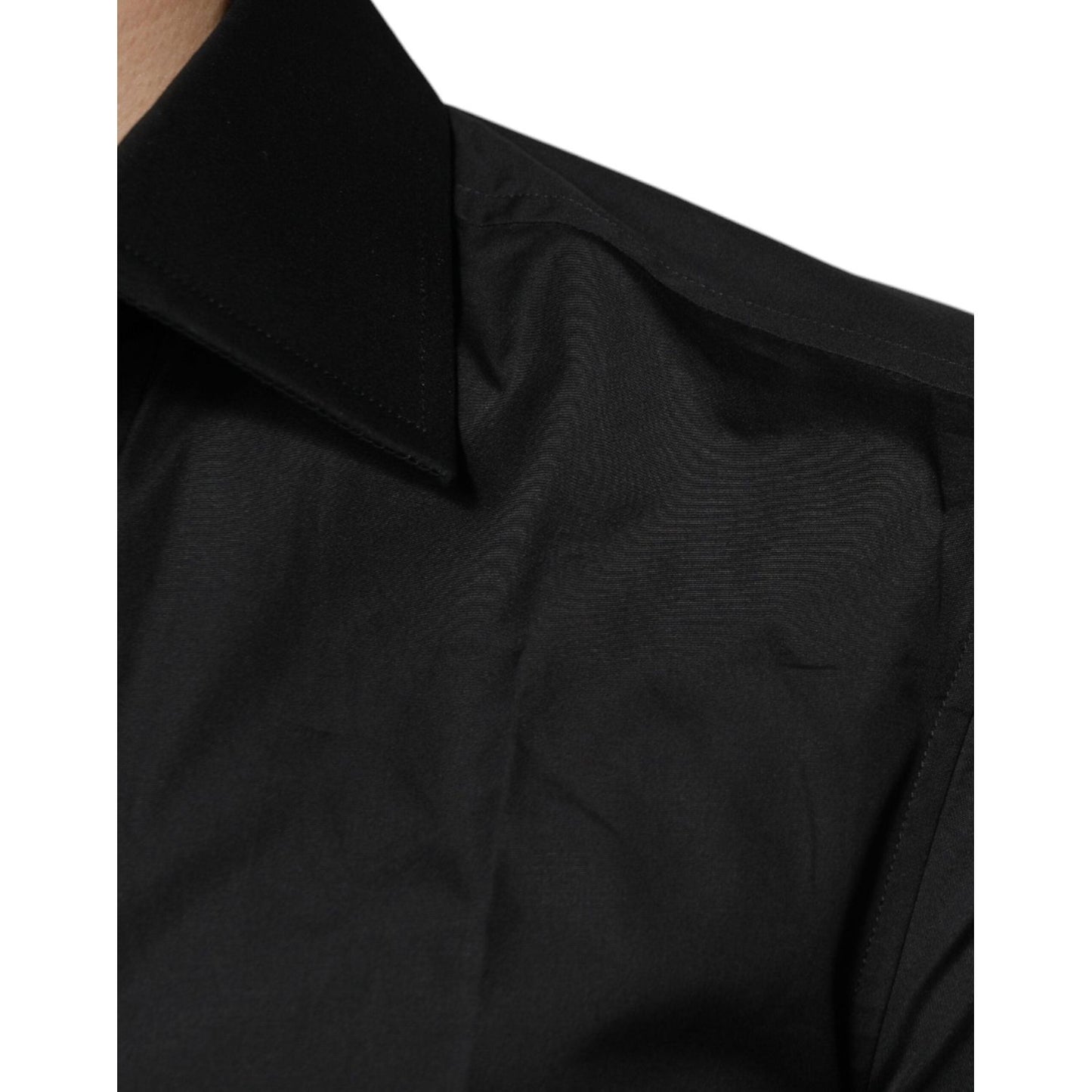 Close-up of Dolce & Gabbana black cotton formal dress shirt with classic collar and long sleeves, featuring a slim fit design.