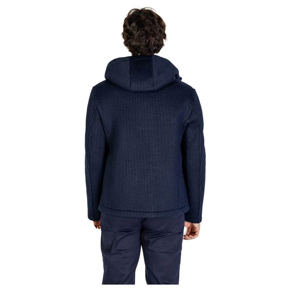 Back view of a man wearing a Hydra Clothing blue polyester jacket from the fall/winter collection, featuring 75% polyester and 25% wool.